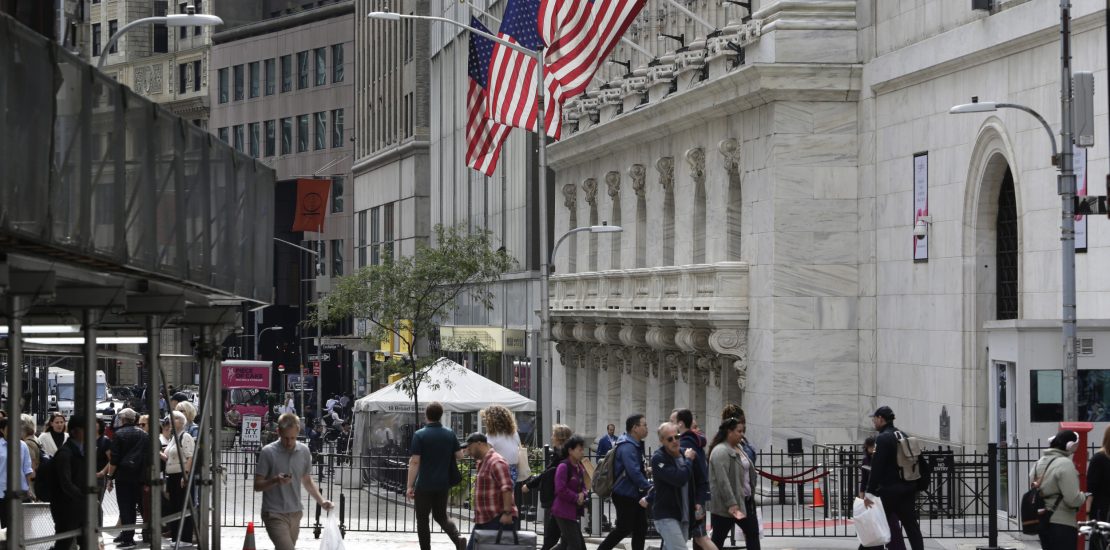 People walking on Wall street